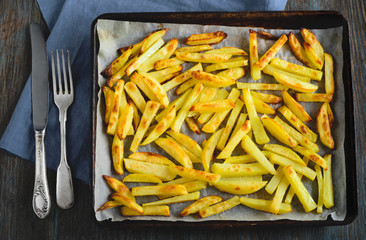 Baked potatoes on a baking sheet