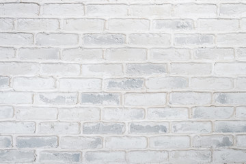 Abstract horizontal white background of a brick wall.