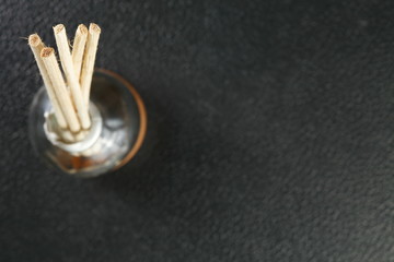 Aroma bottle with wood stick represent the aroma therapy equipment material.