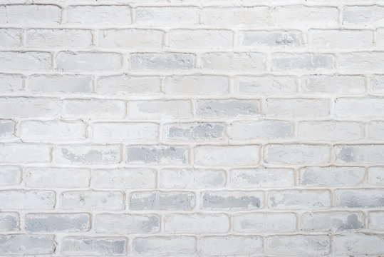 Abstract horizontal white background of a brick wall.