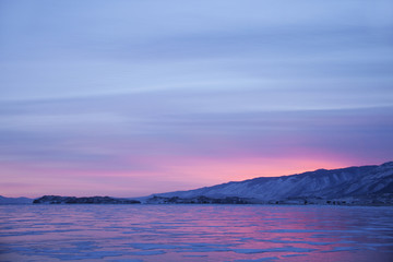 Lake Baikal, winter. Cape Uyuga sunset landscape.