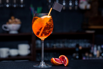 Cocktail on the bar with orange
