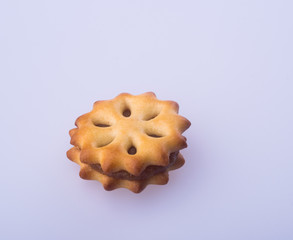 cookie biscuits with filling on background