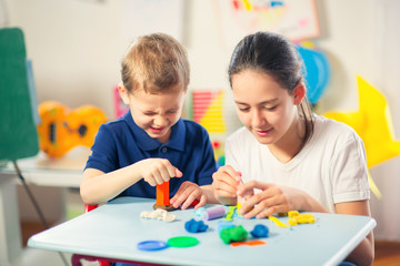 Kids Play Modeling Plasticine in the living room