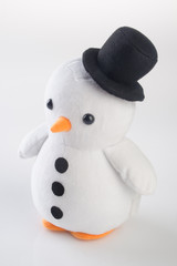 toy or funny handmade toy penguins on background.