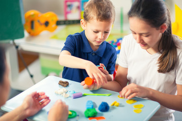 Kids Play Modeling Plasticine in the living room