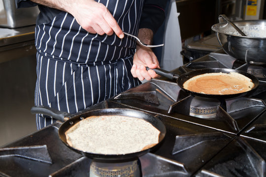 Chef Cooking Omelette In A Restaurant