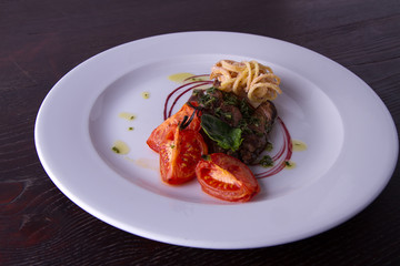 sliced beef served with home made pasta and tomato