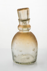 Old glass carafe, white background