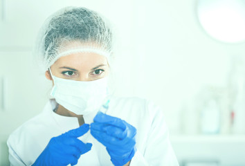 Fototapeta premium Nurse making injection