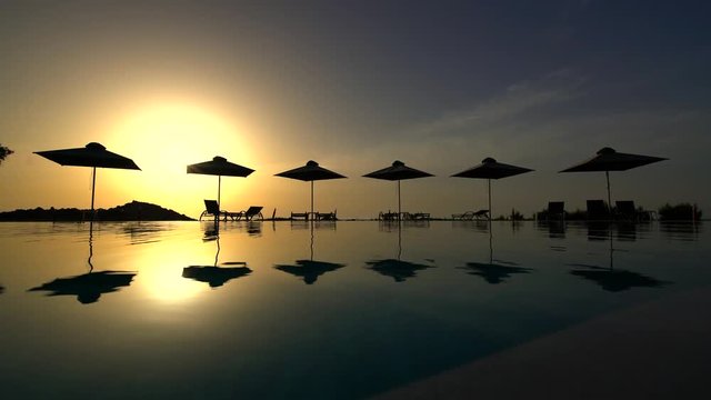swimming pool at sunset