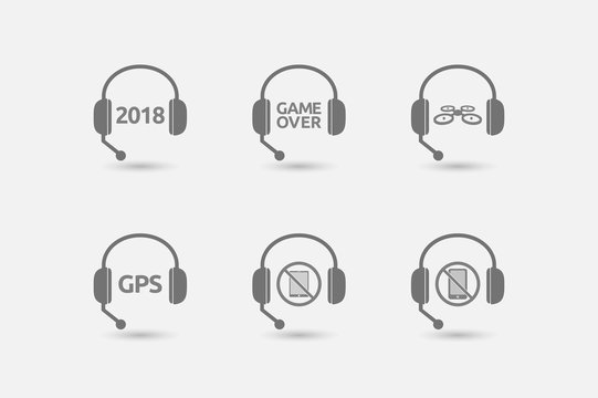 Set of hands free headsets with  technology related icons