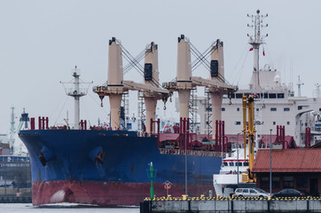 BULK CARRIER IN THE PORT OF SWINOUJSCIE - Marine transportation industry © Wojciech Wrzesień