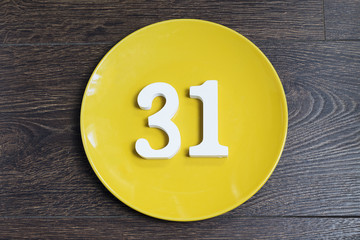 Figure thirty-one on the yellow plate.