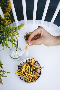 Girl Holding Parsnip Fries