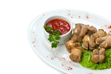 chopped sausages fried with vegetables and spices