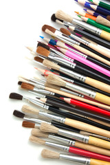Obraz premium colored pencils and brushes