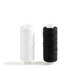 Two spools of thread
