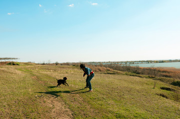 Fototapeta na wymiar walking woman with dog
