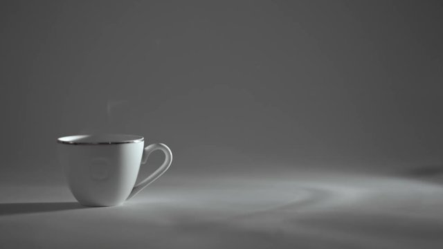 white Cup of hot tea or coffee, steam comes.