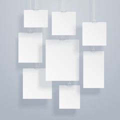 Blank white image and photo frames on wall vector illustration