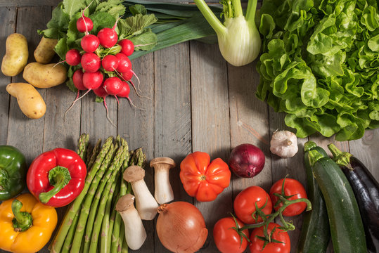 Healthy fresh vegetables on rustic wood