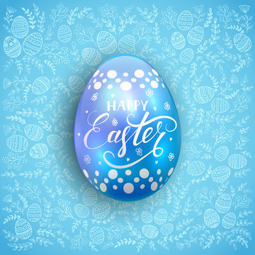 Blue Easter egg with floral patterns