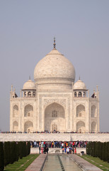Fototapeta na wymiar Taj Mahal (Crown of Palaces), an ivory-white marble mausoleum on the south bank of the Yamuna river in Agra, Uttar Pradesh, India 