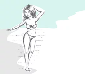 Foto op Canvas vrouw loopt langs het water in bikini © emieldelange