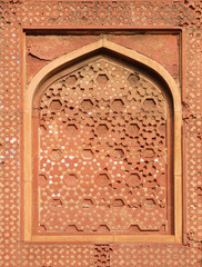 Stone pattern on a temple wall in Red Fort, Agra, UNESCO World heritage site, India 