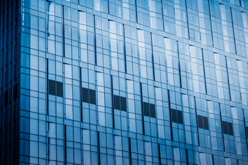 Fototapeta na wymiar Urban abstract - windowed corner of office building