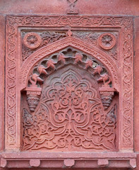 Stone pattern on a temple wall in Red Fort, Agra, UNESCO World heritage site, India