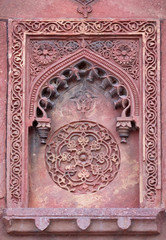 Fototapeta na wymiar Stone pattern on a temple wall in Red Fort, Agra, UNESCO World heritage site, India