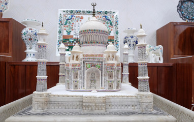 Marble replica that almost resembles the world famous Taj Mahal display at souvenir shop in Agra,...