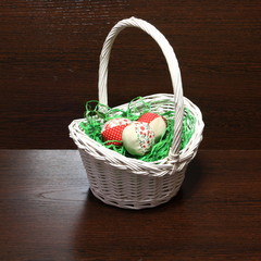 Decorative sewn from rags eggs are in the basket.