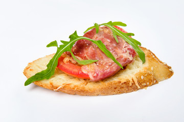 Sandwich with serrano ham, cheese and arugula
