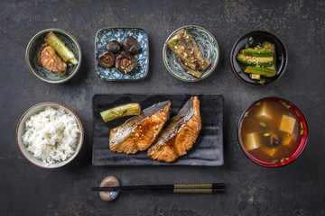 Traditional Japanese dish with Fish Teriyaki and Soup as close-up in bowls