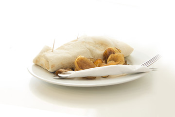 Tortilla served on white background