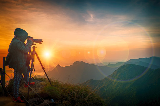 Photographer at sunrise