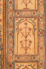 Beatiful ornament on wall of palace in Amber Fort in Jaipur, Rajasthan, India