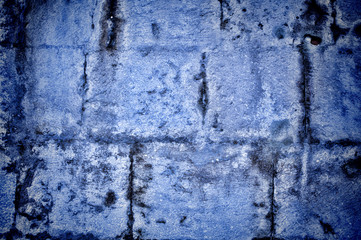 Obraz premium Vignetted stone wall background with lots of texture