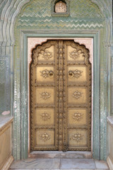 Ornate door at the Chandra Mahal, Jaipur City Palace in Jaipur, Rajasthan, India