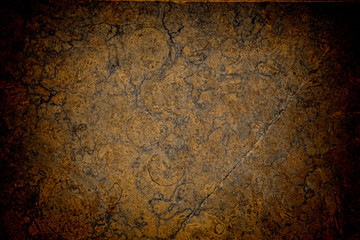 Vignetted stone wall background with lots of texture