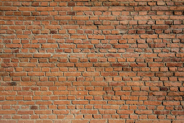 Red brick wall for construction texture.