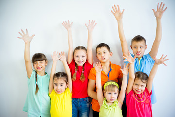 Kids raising hands