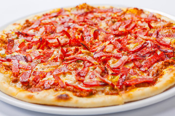 Pizza with Pepperoni Sausage and Bacon.