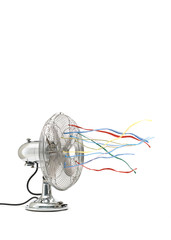 Fan with colored ribbons in front of white