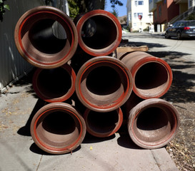Stacked construction pipes.
