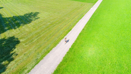 Young Woman Jogging In The Fields