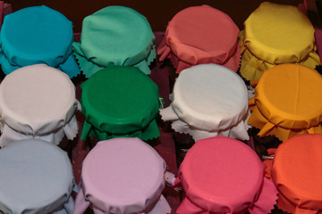 Colorful Fabric Jar Covers in Red Box